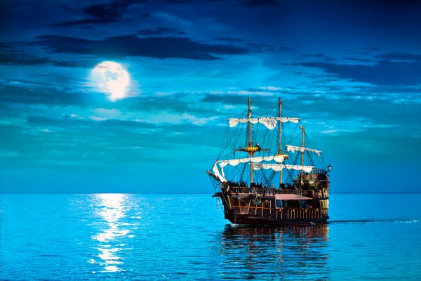 depositphotos_42988375-stock-photo-pirate-ship-sailing-under-the