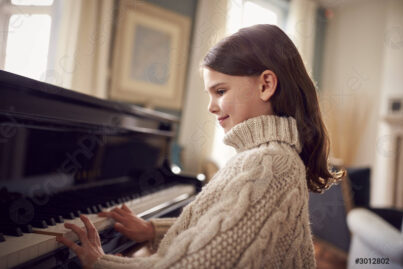 young-girl-learning-play-piano-3012802